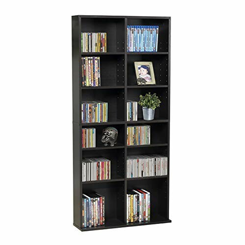 Black media storage shelf with DVDs and decor.